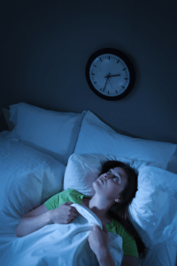 a woman with insomnia symptoms